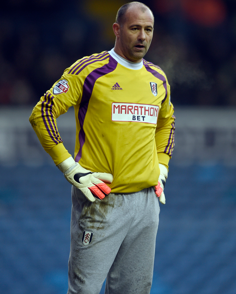 With Fulham in 2014. The skinny jean phenomenon bleeding over into Hungarian keeper sweatpant fit trends? Photo via Getty